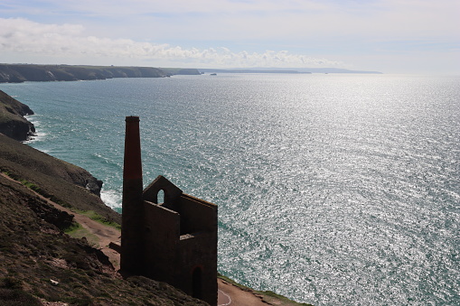 Wheal Coates tin mine ruins, Cornwall, overlooking a glittering sea in sunshine