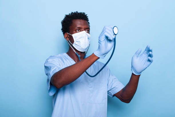 istock Healthcare nurse holding and using stethoscope 1493495385