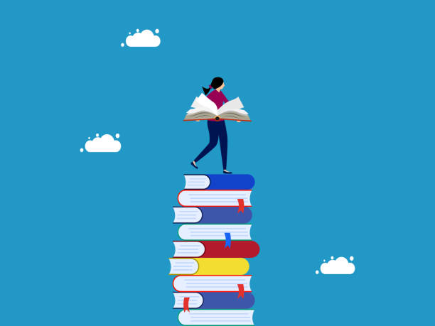 istock Lifelong learning. woman holding books on stack of books 1493496835