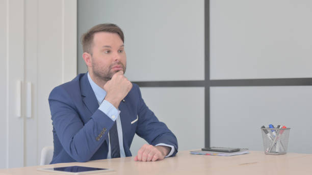 istock Thoughtful Businessman Thinking of New Idea 1493503304