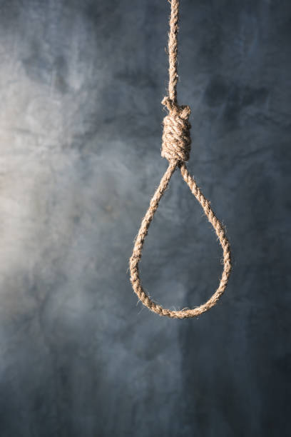 istock the noose against grunge wall background, failure or commit suicide concept 1493503910