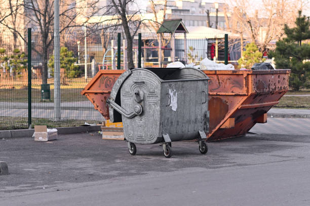 istock Two metal garbage cans. unsorted garbage. Outdoor. 1493508368