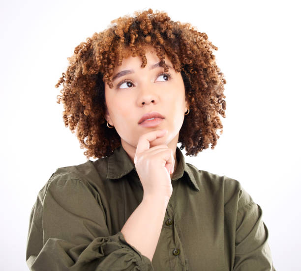 istock Thinking, concentrating and remember with black woman for confused, wondering and solution. Focus, why and question with girl isolated on white background studio for choice, ideas and decision 1493509117