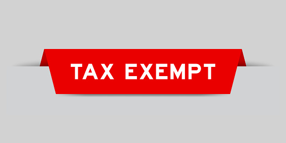 Red color inserted label with word tax exempt on gray background