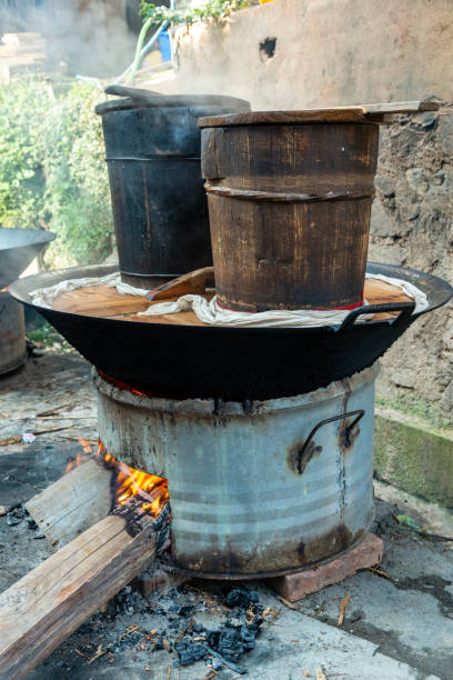 istock Outside village cooking rice on wood fire 1493510228