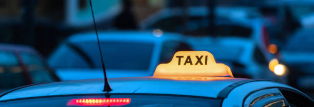 istock car with taxi sign 1493514635