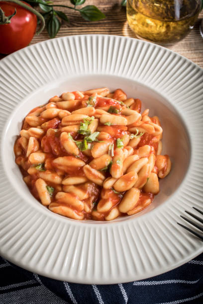 istock Cavatelli pasta with fresh tomato sauce. 1493514691
