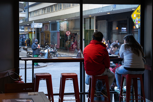 São Paulo, SP, Brazil - MAY 24 2023 - couple having coffee in a famous coffee shop in the city center of São Paulo