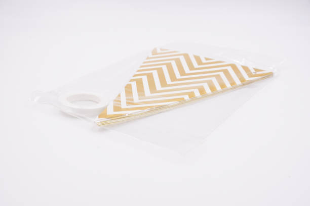 istock Gold and white pennant banner bunting triangle flags for party 1493520381