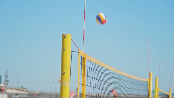istock People Playing Beach Volleyball on Hot Sunny Day 1493522695