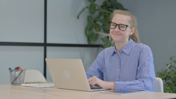 istock Yes, Young Woman Shaking Head in Approval 1493524081