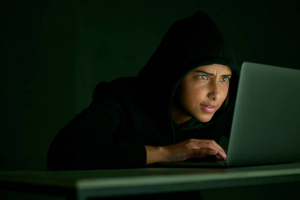 istock Indian woman, hacker and mockup of banking and database web fraud with crypto data. Programmer, criminal and finance software hack with a hacking expert writing algorithm for cybercrime virus 1493524575