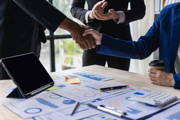 istock Business people meeting explain financial graph data and marketing plan, assess status of business investment and marketing and brainstorm new business project, financial investment concept. 1493524650