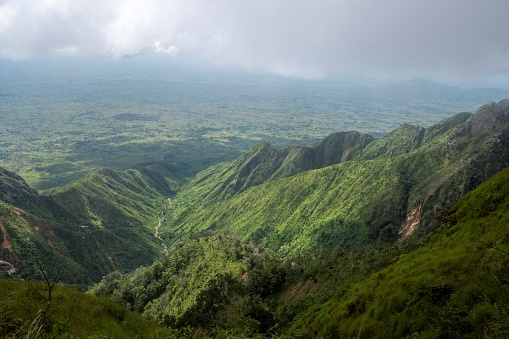 Dramatic view of the steep green mountains and cliffs of the Zomba Plateau in Malawi