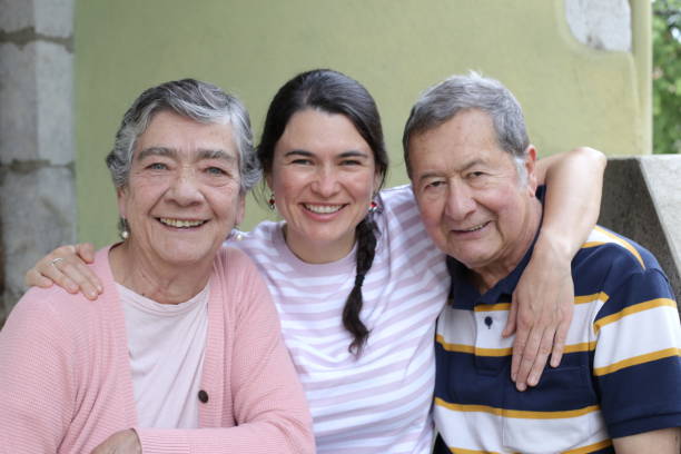 istock Proud senior parents with daughter 1493526272