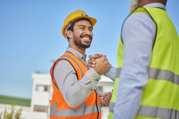istock Engineer, men outdoor and greeting with handshake, partnership and success for new project. Architecture, coworkers or male employees with agreement, friends or collaboration for building development 1493526278