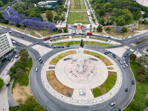 Top drone view video of Marquês de Pombal Square roundabout - Avenida da Liberdade, Lisbon.
