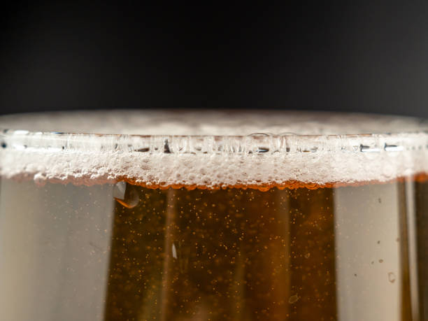 istock A glass of cold beer on a dark background. 1493536720