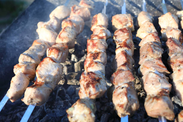 istock Cooking pork kebabs on skewers 1493537540