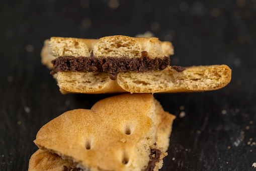 fresh crunchy cookies with chocolate filling , fresh crunchy sandwich cookies close-up