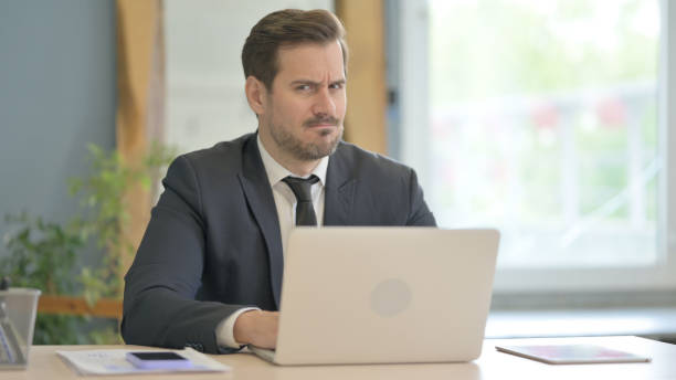 istock No, Rejecting Businessman Waving Finger at Work 1493543450