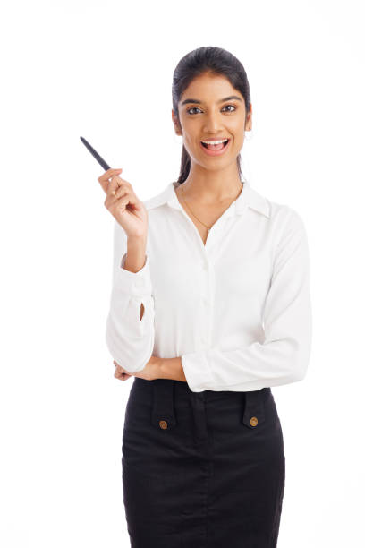 istock Beautiful young business woman posing with pen 1493545949