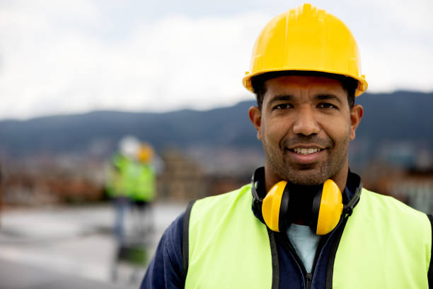 istock Portrait of a construction worker at a building site 1493546526