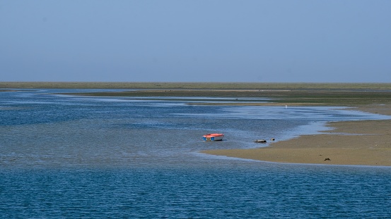 The Ria Formosa is a natural park with picturesque white sandy beaches and serves as a protected habitat for a wide array of wildlife.