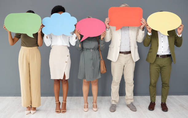 istock Communication, feedback and mockup with business people and speech bubble for logo, social media and forum. Opinion, vote and branding with group and chat sign for idea, survey and text message icon 1493549168