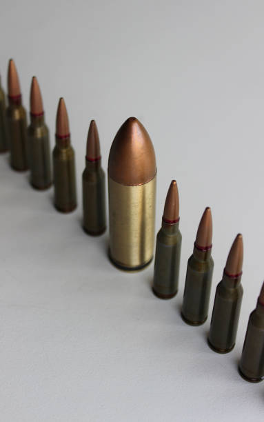istock Inclusion And Diversity. Row of same bullets with one big bullet lined out isolated on white 1493551807