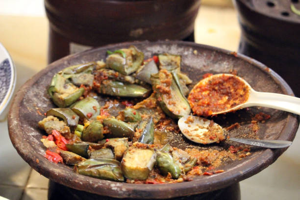 istock Selective focus of spicy cooked eggplant on earthenware plate 1493551838