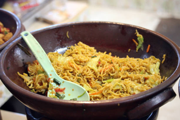 istock High angle view of delicious fried noodles in an earthenware bowl 1493551839