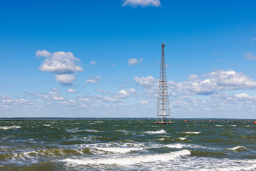 Towering beacon: communication tower as lighthouse in James River, Newport News, VA