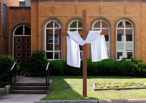 First Baptist Church facade and lawn with Cross in Newport News, Virginia