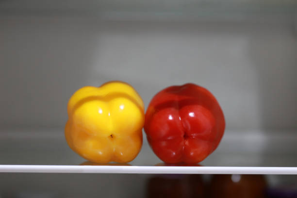 yellow red capia pepper in the fridge