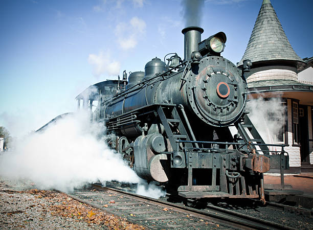 istock Vintage Steam Locomotive On a Clear Day At Train Platform 149355629
