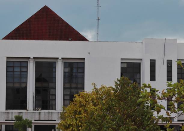 istock A white building with lots of windows and a red roof 1493558223