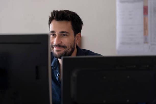 istock white collar man working hard in the office 1493560569