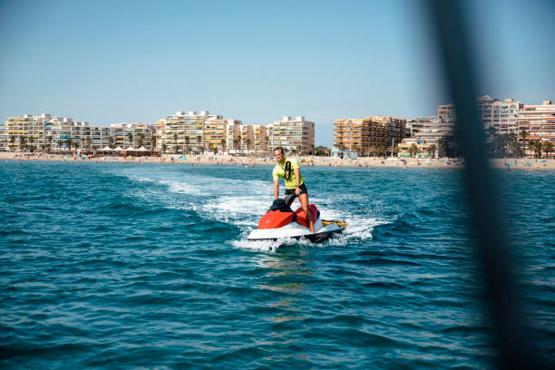 istock Lifeguard man on summer work Skillfully Maneuvering a Jet Ski 1493567753