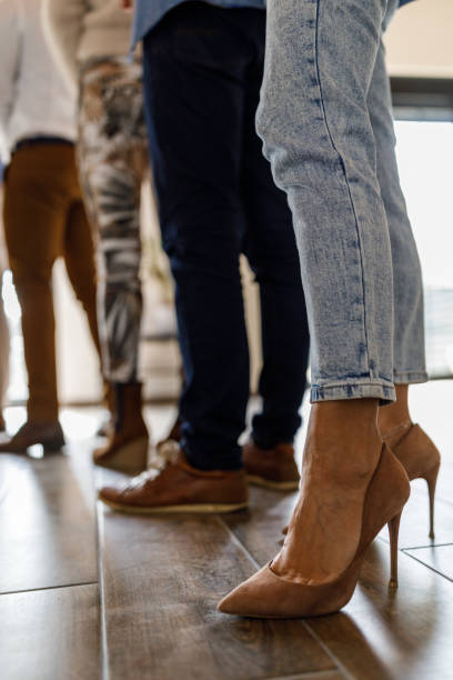 istock Group of unrecognizable people standing in line and waiting 1493576865