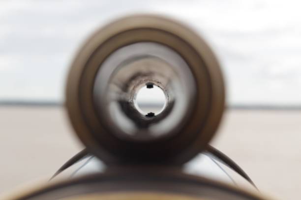 Detailed view of an antique camera on a white background, emphasizing its controls and classic design. Ideal for highlighting retro photography equipment.