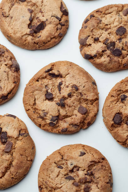 istock Fresh Chocolate Chip Cookies on White Background 1493581831