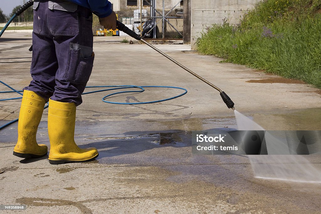washing washing industrial floor in a industry High Pressure Cleaning Stock Photo