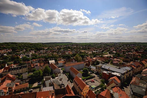 Naumburg town, downtown district. German landscape, beautiful view in Germany. Panoramic picture, traveling concept photography. Red roofs of buildings in Saxony-Anhalt. Panorama photo, sky, clouds and street in Europe.