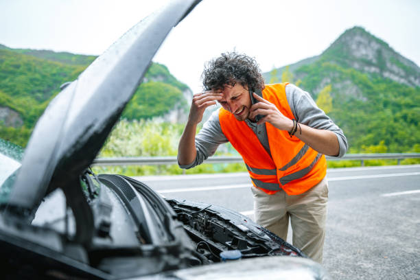 istock Man had a car breakdown and calling roadside assistance. 1493593813