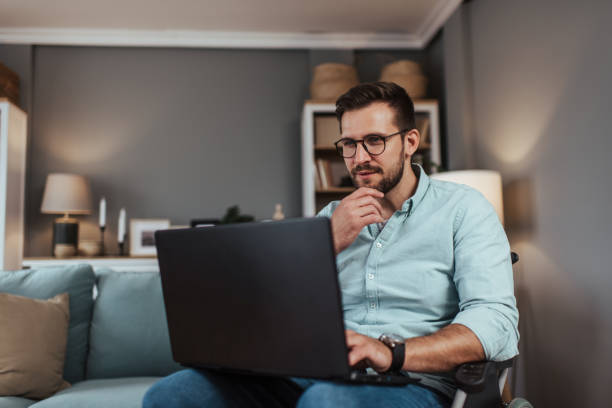 istock Disabled businessman working from home 1493595484