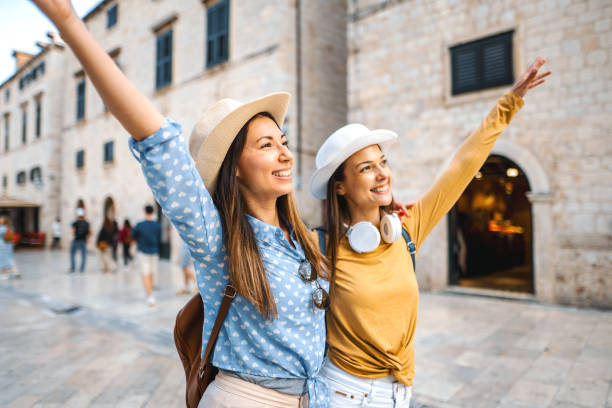 istock Two young female tourists exploring the city 1493599707