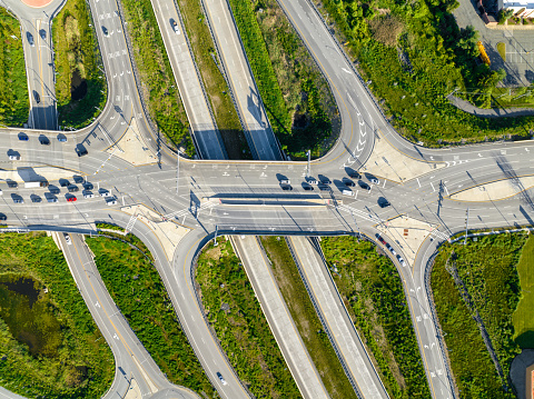 Aerial, drone, afternoon photo of a diverging diamond interchange (DDI), located in Woodbury, NY.
