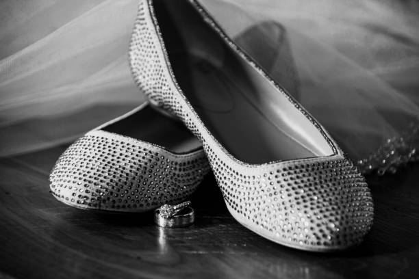 istock BRIDES SHOES AND WEDDING RINGS 1493606099
