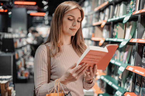 istock Woman at Bookstore 1493608436